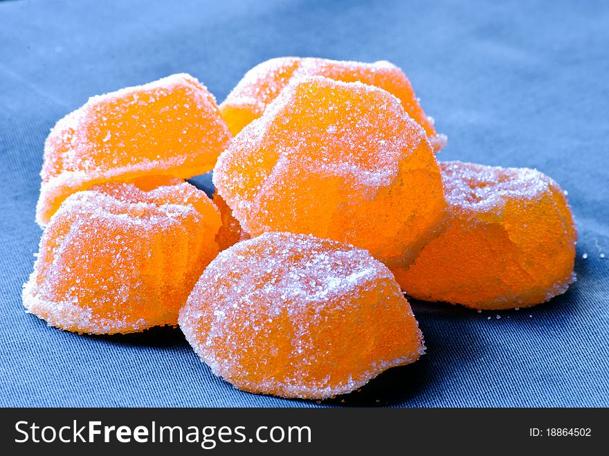 Group of Jujube in sugar. Macro.