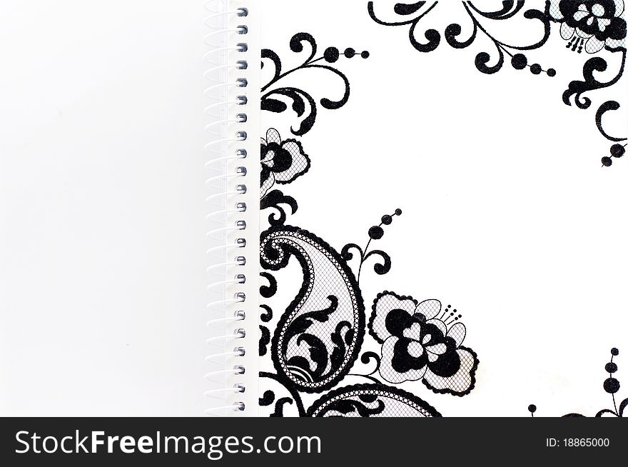Fine texture of a bound notebook on white background. Fine texture of a bound notebook on white background.