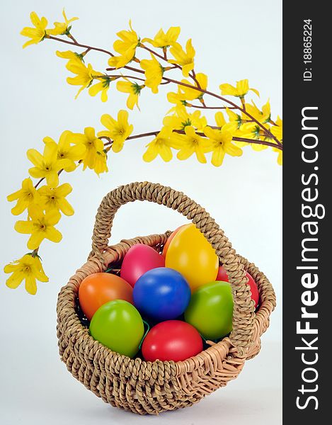 Easter basket with colored eggs