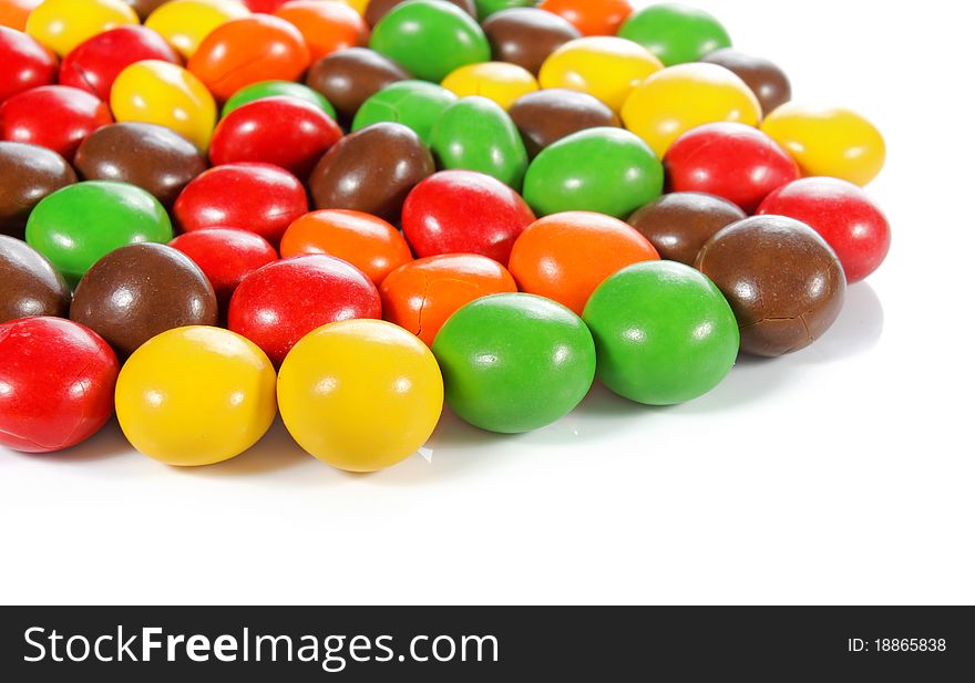 Close up of colorful chocolate candy isolated on white background