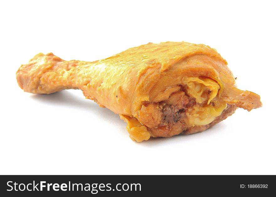 A chicken leg isolated on a white background