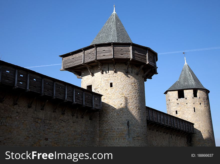 Walls and tower of the medieval castle in Carcassonne.France