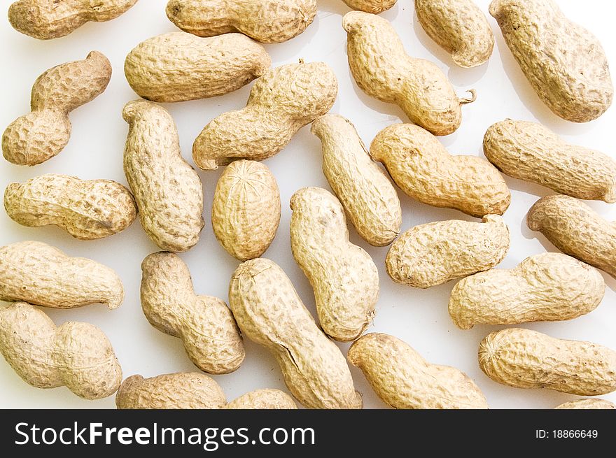 Close up on peanuts, isolated on white. Close up on peanuts, isolated on white