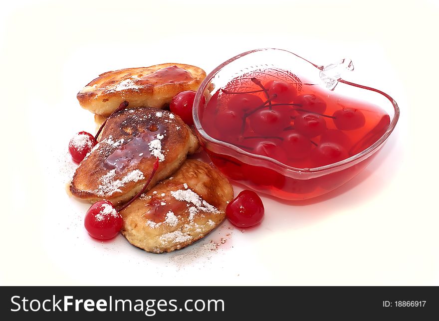 Pancakes with jam in a glass bowl