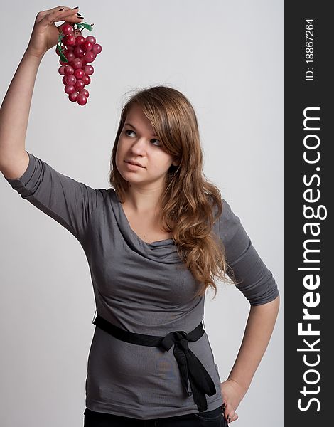Girl With Grapes In His Hand