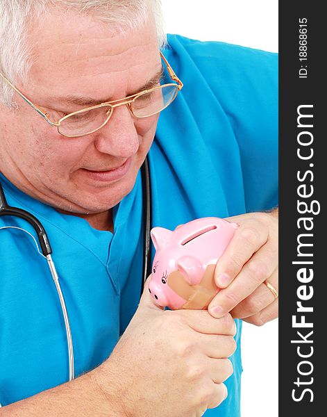 Man in scrubs with a piggy bank