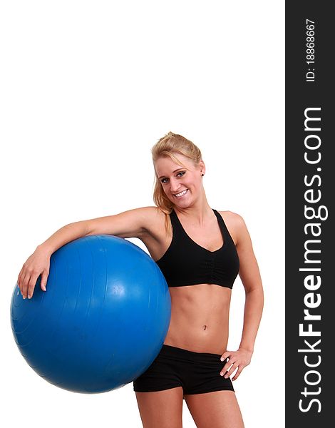 Young woman standing with exercise ball. Young woman standing with exercise ball