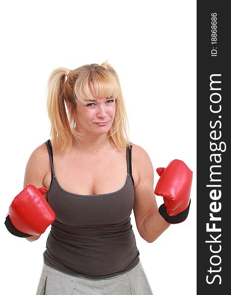 Funny mature woman with red boxing gloves. Funny mature woman with red boxing gloves