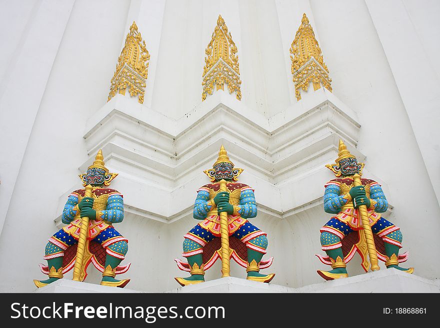 Giant Guardians On Base Of Pagoda, Thailand