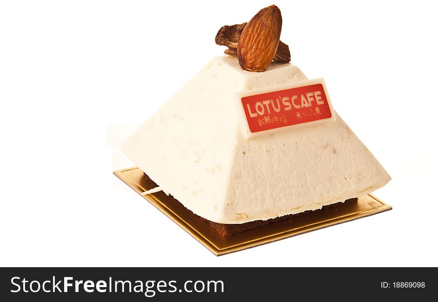 Cake with icing on white isolated background