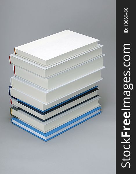 Stack of  eight plain books