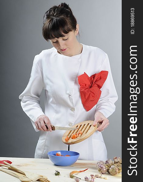 Girl cooking vegetables