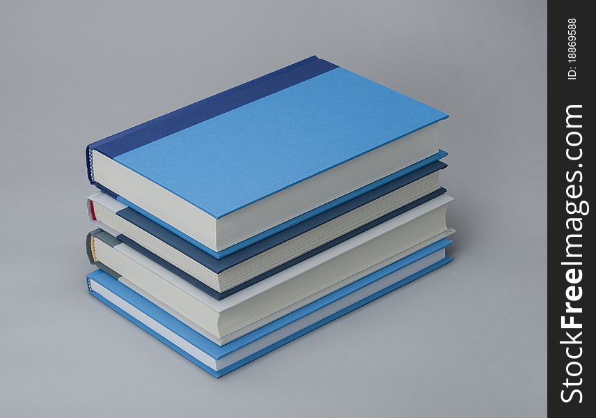 Stack Of Four Plain Books For Design Layout