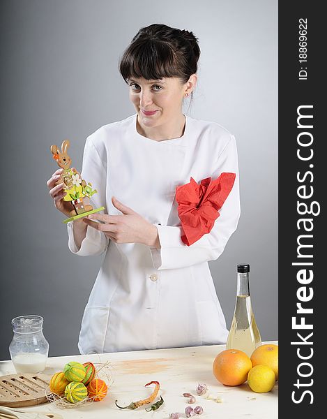 Young woman presenting easter decorations. Young woman presenting easter decorations