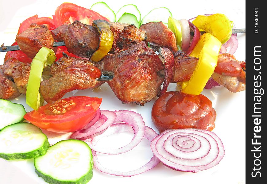 Grilled barbecue meat with vegetables