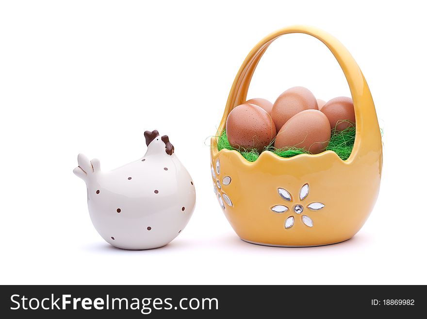 Basket full of Easter eggs with chicken