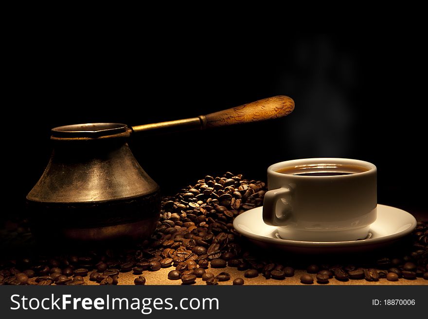 Beautiful coffee still-life on a black background