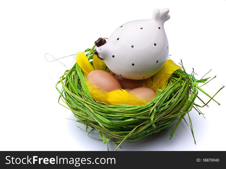 Nest full of Easter eggs with chicken. Nest full of Easter eggs with chicken