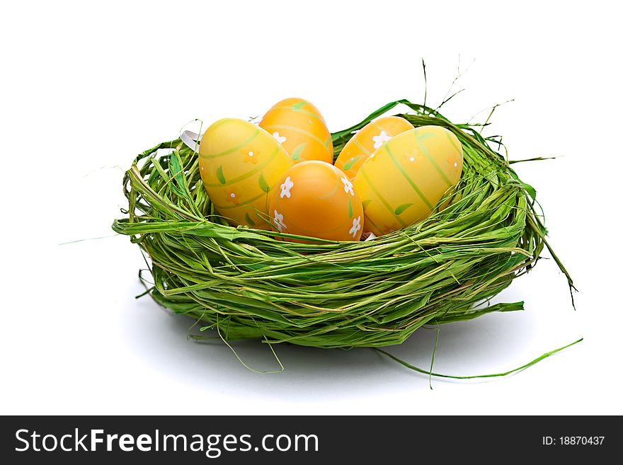 Nest full of eggs. Isolated on a white background. Nest full of eggs. Isolated on a white background.