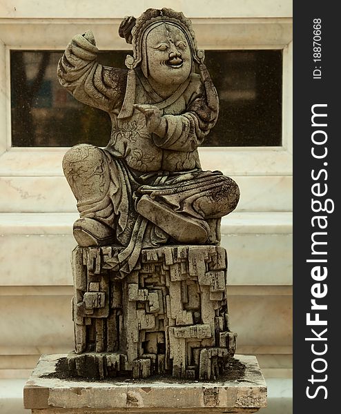 Ancient chinese sculpture in a temple of thailand