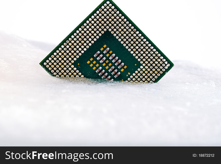 Processor in ice on white background