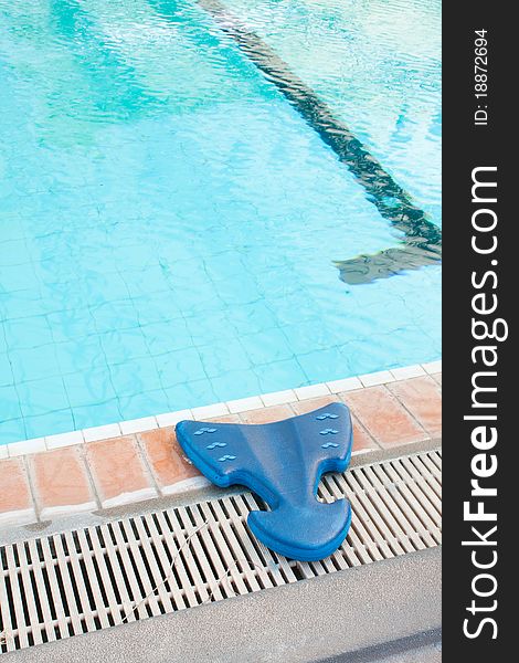 Learn to swim equipment blue Located along the edge of the pool. Learn to swim equipment blue Located along the edge of the pool.