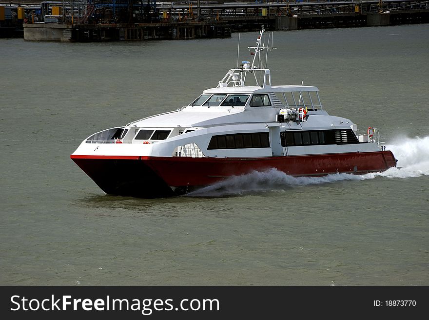 A fast catamaran passenger ferry underway. A fast catamaran passenger ferry underway