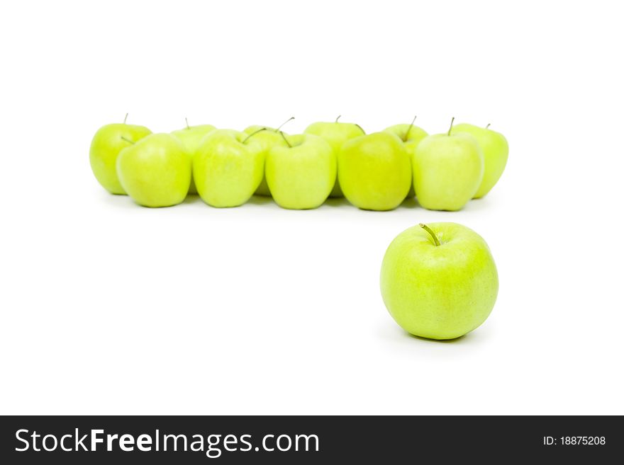 Green and yellow apples on a white background