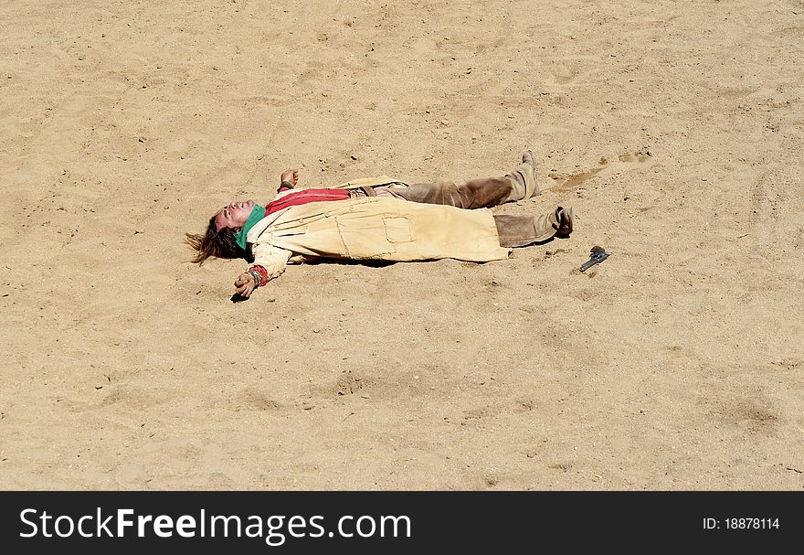 Bandit being shot in a Gunfight at Mini Hollywood, Almeria, Andalusia, Spain