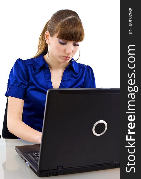 Beautiful caucasian businesswoman working on laptop