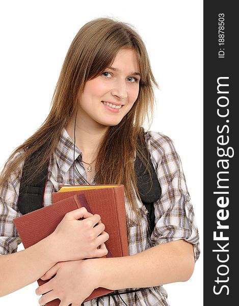 Beautiful girl with a backpack, holds the book, on a white background