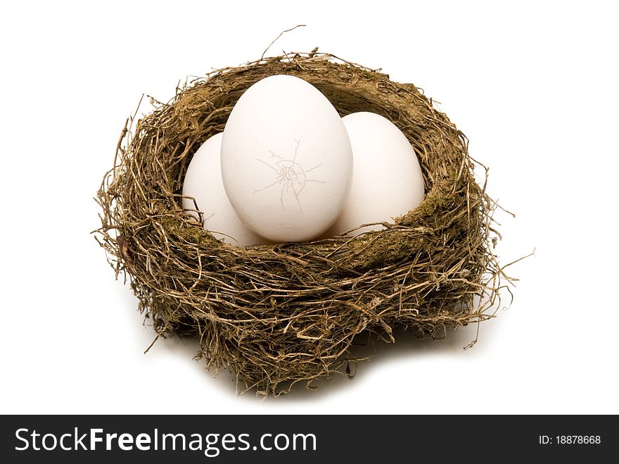 Group of eggs where the top one has a crack. Isolated. Studio shot. This is one bad egg in a group of three. Group of eggs where the top one has a crack. Isolated. Studio shot. This is one bad egg in a group of three.