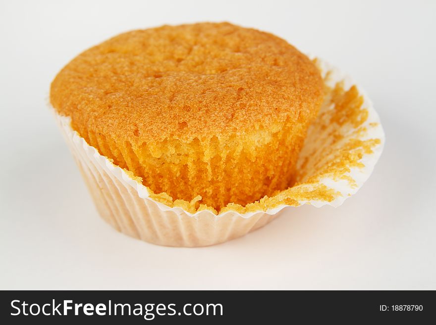 Sweet muffin against white background