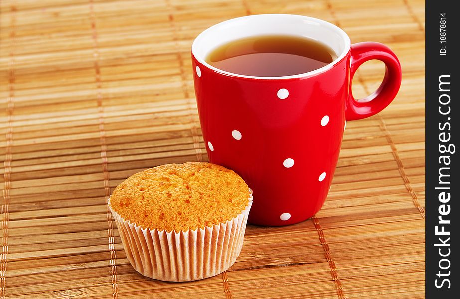 Cup of black tea with muffin. Cup of black tea with muffin