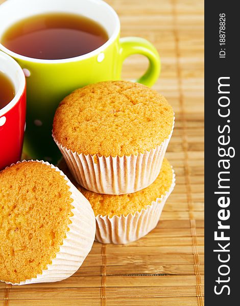 Cups of tea with cakes. Cups of tea with cakes