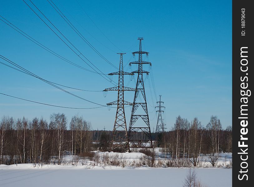 Reliance power lines on the background of a winter clear sky