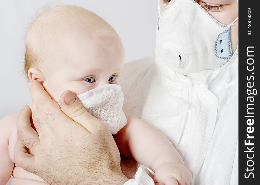 Baby In A Medical Mask