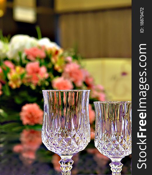 A high-res photo of a formal banquet. Main focus is on the flowers