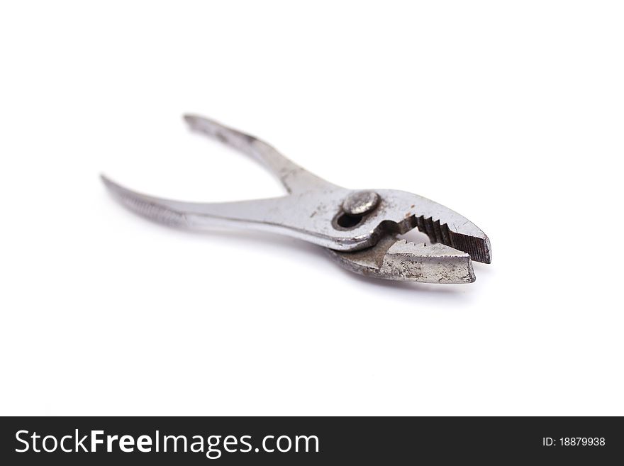 Old silver metal pliers isolated over white background