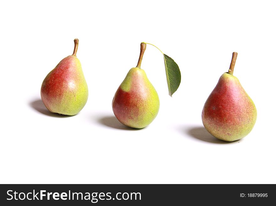 Ripe pear with shadow isolated on white background
