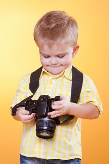 Small Smiling Photographer Watch Photo On Camera Stock Images Small Smiling Photographer Watch Photo On Camera Stock Images