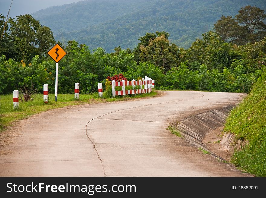 Curve sign for curve road on mountain. Curve sign for curve road on mountain