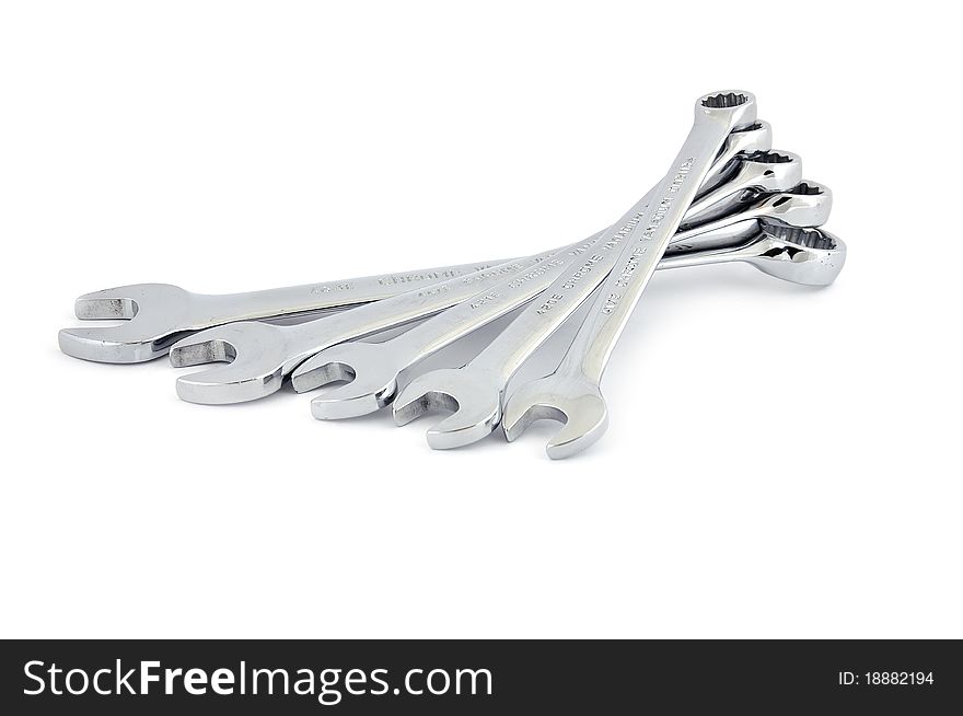 Set of wrenches on white background