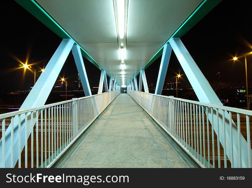 Footbridge with light trails in Hong Kong