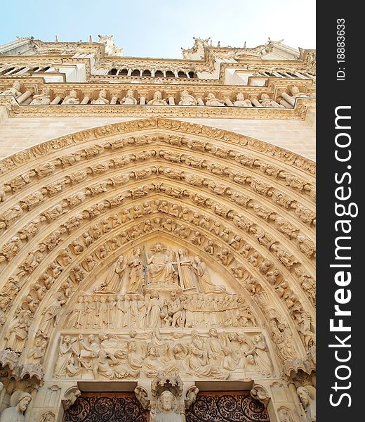 Gothic sculptures of saints in the facade of Notre Dame de Paris cathedral. Antique filter and vignetting in Paris , France. Gothic sculptures of saints in the facade of Notre Dame de Paris cathedral. Antique filter and vignetting in Paris , France