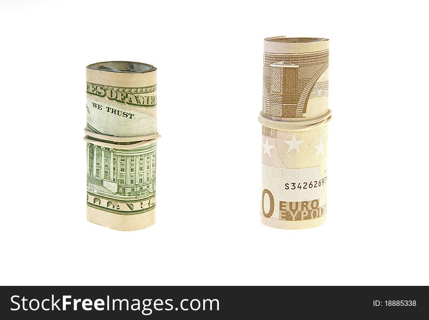 Rolls of euro and dollar on a white background. Rolls of euro and dollar on a white background