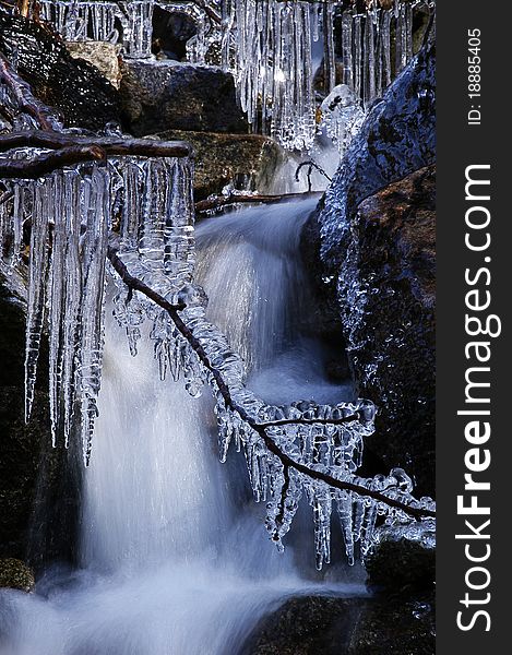 View of a small frozen waterfall in Slovakia. View of a small frozen waterfall in Slovakia
