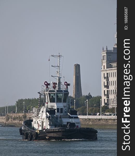 Tug boat traveling through the water