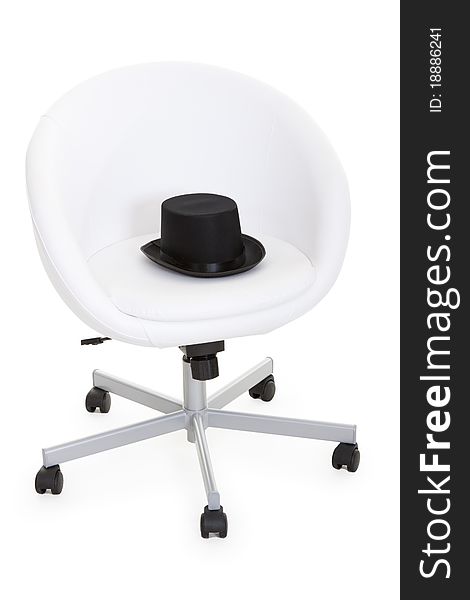 Black slouch hat is a white leather armchairs. Black slouch hat is a white leather armchairs