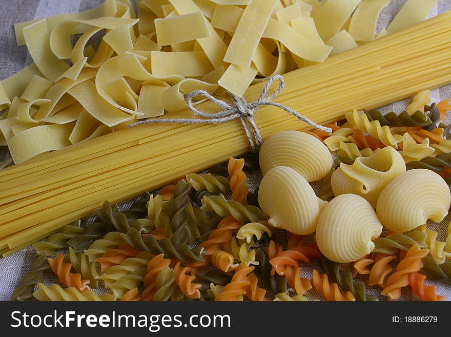 Various types of pasta - spachetti, fusilli, lumaconi